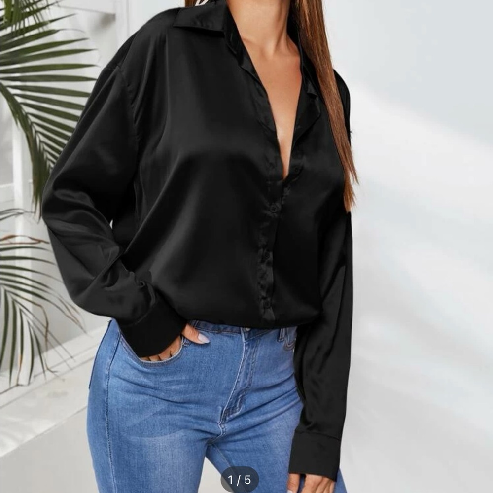 Women’s black button down blouse